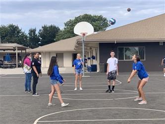 children playing volleyball